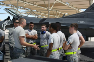 Andrew Hannah instructing Air Force personnel during his military service as an F-16 maintenance instructor